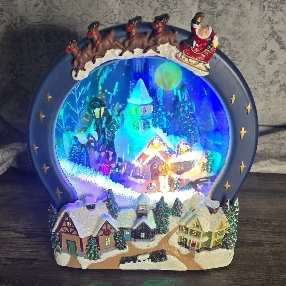 Two snow globes, animated snow, one is musical  and lights up htf